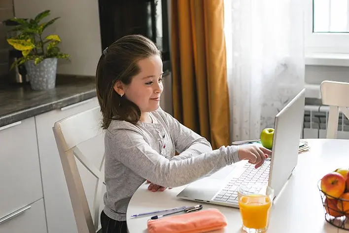 Student participating in online science learning activities with digital tools and experiments